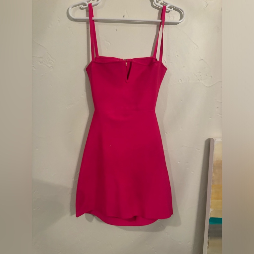 NBD Pink Spaghetti Strap Mini Dress with cut out in the back.